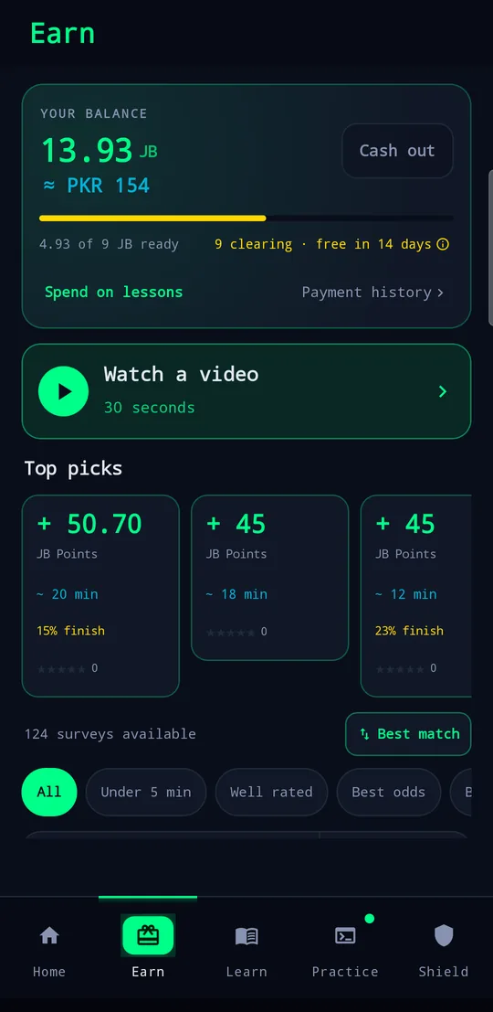 The Earn screen showing balance, a video reward and a list of surveys